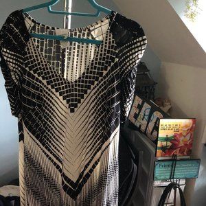 Unique design dress; silky feel; flows; lays nice